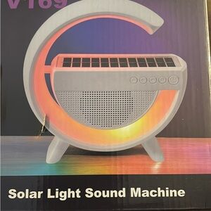 White Solar-Powered Portable Speaker with Futuristic Design